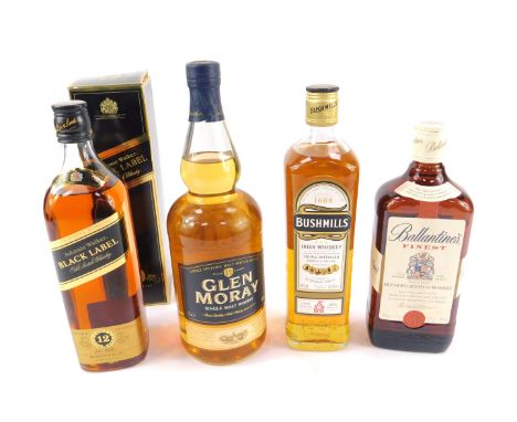 A bottle of Johnny Walker Black Label Old Scotch Whisky, 75cl, boxed, Ballantine's Finest Scotch Whisky, 70cl, Bushmills Iris