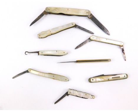 Seven Victorian and later mother of pearl bound folding pocket knives, with steel blades, together with a mother of pearl bou