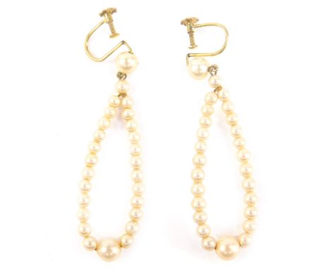 A pair of 9ct gold and simulated pearl drop earrings, each earring in the form of a drop, with graduated size stones, and 9ct
