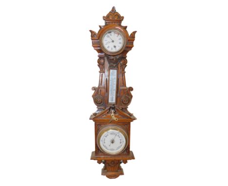 A Victorian oak cased clock and barometer, with thermometer, the case of carved classical architectural form, with key, 84cm 