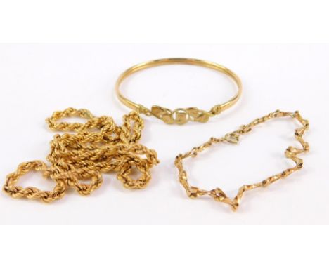 A 9ct gold bangle decorated with Charles Rennie MacKintosh floral motifs, 9ct gold rope twist neck chain, and a 9ct gold brac