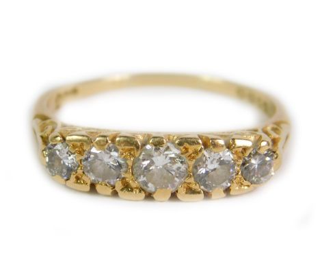 An 18ct gold five stone ring, in a graduated Victorian style setting, 4.1g all in. 