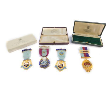 A George V silver gilt and enamel Masonic jewel, Kenya Lodge of MMM, No 952, Founder 1935, and three further jewels, boxed. (