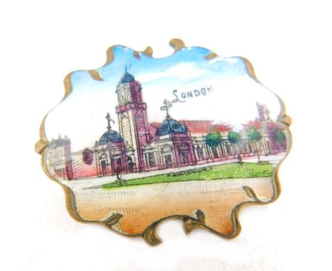 A late 19thC enamel London souvernir badge, depicting typical London scene in enamel design, with scroll design borders, on g