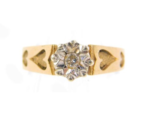 A 9ct gold and diamond solitaire ring, illusion set in a high claw setting with double heart engraved shoulders, size L, 3.0g