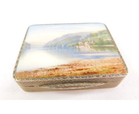 A George V silver and guilloche enamel lipstick compact, decorated with a lake scene, import marks, H C Freeman Ltd, London 1