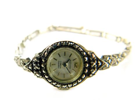 A Rotary lady's stainless steel cased and marcasite set cocktail wristwatch, circular white dial, on a marcasite bracelet wit