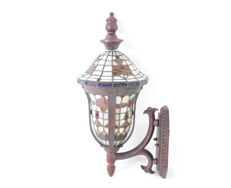 A Tiffany style wall light, of bell shaped form, 49cm H.