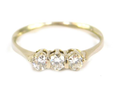 An 18ct white gold and diamond three stone ring, approx 3/8cts, size N, 2.1g.