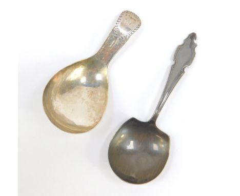 A George III silver tea caddy spoon, with bright cut engraving, monogrammed reserve, Josiah Snatt or John Shea, London 1905, 