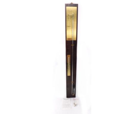 A Torricelli mahogany cased stick barometer, with brass plates and French gauges, boxed.