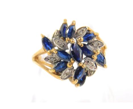 A 14ct gold sapphire and diamond ring, in an abstract swirl design, size L, 3.4g.