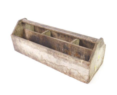 An early 20thC pine carpenters tool caddy, with four section interior, 61cm W, 23cm D.