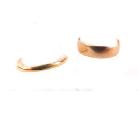 A 9ct rose gold wedding band, size I/J, and a further 9ct gold ring, cut, 3.3g.