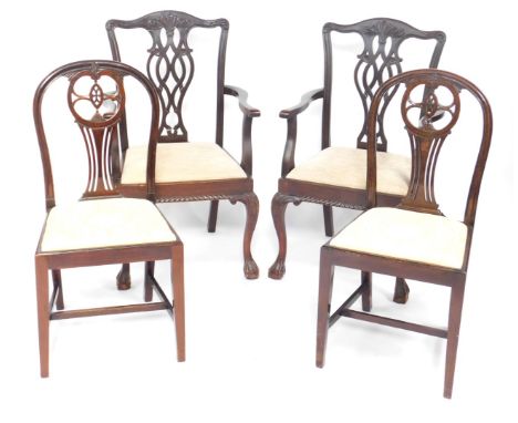 A pair of Chippendale style mahogany carver dining chairs, early 20thC, with foliate carved crest rail and pierced vase shape