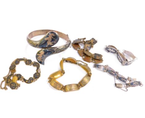 Eastern style jewellery, comprising a silver Sian bracelet, a similar design hinged bangle, and a thin Sian bracelet, a brass