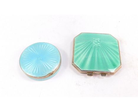 A George VI silver and sea green guilloche enamel compact, with slip case, Birmingham 1940, and a circular silver and turquoi