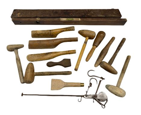 Collection of twelve lead working tools, spirit level in a wooden case and a beam balance