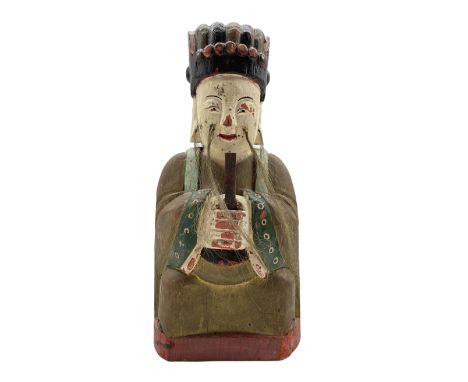 Chinese carved wood and painted archaic style figure decorated in red, black etc and holding a tablet and with a removeable p