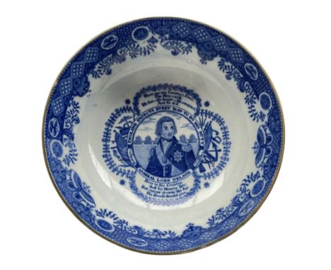 Early 19th century bowl printed in blue with a portrait of Nelson, emblems and verse with a geometric, floral and butterfly b