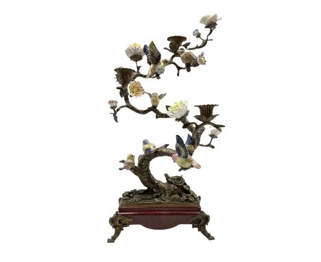 Contemporary bronzed candelabra in the form of a flower encrusted tree set with six porcelain birds in various positions, on 