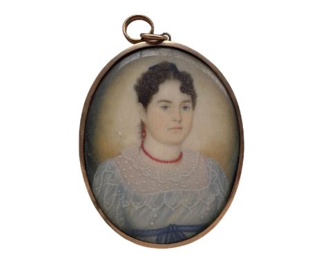 19th century miniature oval head and shoulders portrait on ivory of a lady wearing a coral bead necklace 6cm x 4.5cm