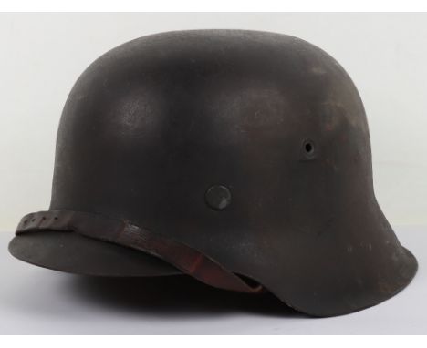 WW2 German M-42 Pattern Steel Combat Helmet, good example of an original M-42 pattern raw edge steel combat helmet which show
