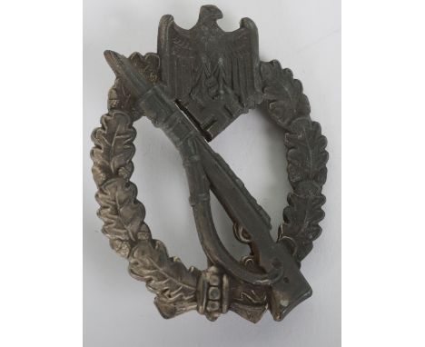 WW2 German Army / Waffen-SS Infantry Assault Badge in Silver, un-maker marked example. Complete with the original pin but rep