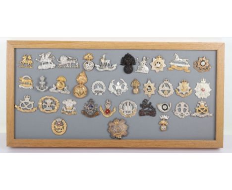 Framed Display of EIIR British Regimental Cap Badges, all being silver, gilt, silver gilt and enamel examples for The Buffs, 