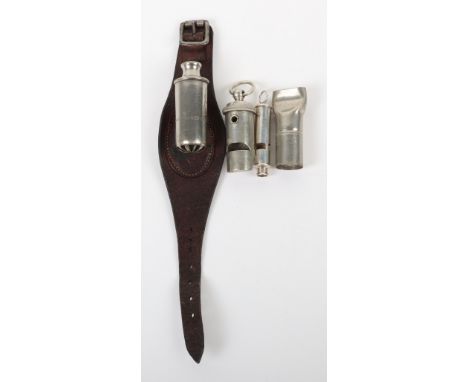 Unusual Grouping of Whistles, including a ACME Siren Hudsons Patent on the leather wrist strap, Develine type by Mossberg Wre
