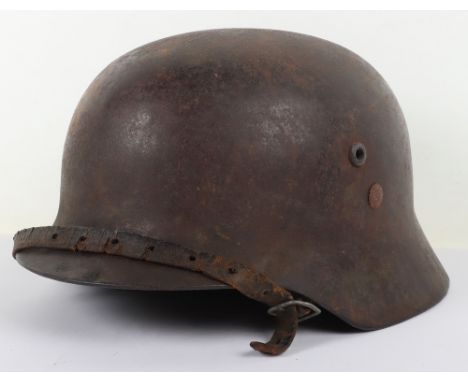 WW2 Axis Forces Hungarian Steel Combat Helmet, well used example of the Hungarian M-38 steel combat helmet which has the rema