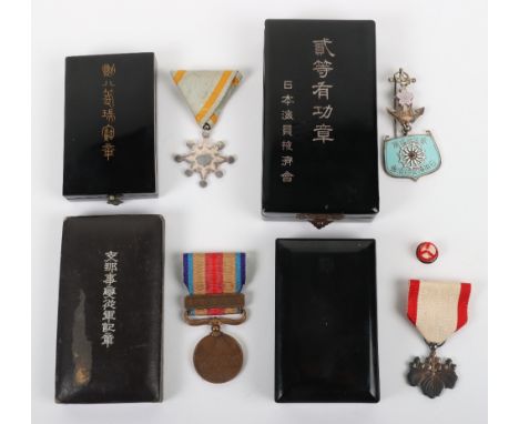 Japanese Military Medals / Orders, including Order of the Sacred Treasure 8th class with the original ribbon and housed in it