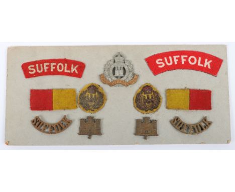 WW2 Suffolk Regiment Badge Grouping, consisting of other ranks cap badge, embroidered and printed shoulder titles, bullion em
