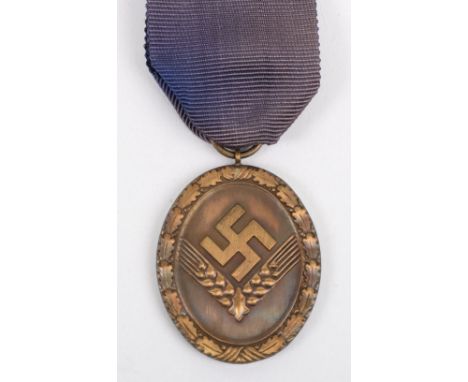 Third Reich Female RAD Labour Service Long Service Medal, bronze medal complete with blue ribbon. Medal believed to be a Rudo