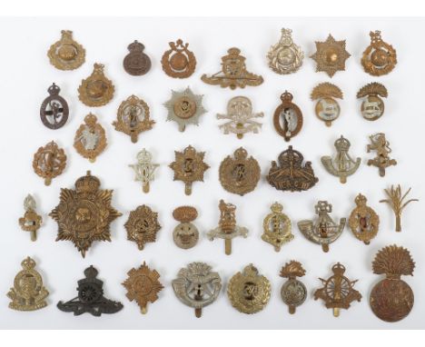 40x British Regimental Cap Badges, including bi-metal Royal Munster Fusiliers, Royal Welch Fusiliers, bronze OSD Royal Artill