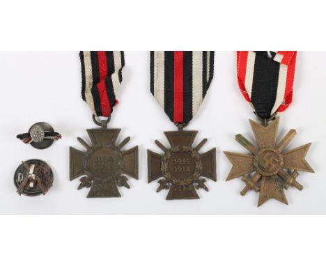 WW2 German War Service Cross 2nd Class with Swords, complete with its ribbon and much of the bronze finish. Accompanied by 2x