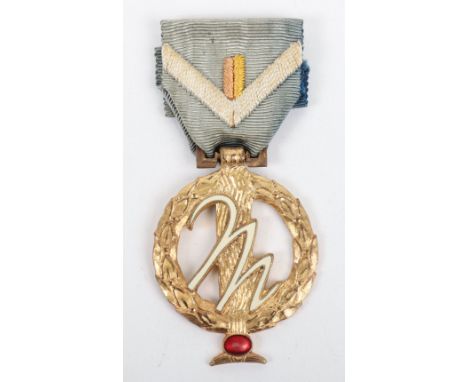 Italian Fascist National Party Medal (PNF), gilt and enamel medal complete with ribbon, front of the ribbon faded at the fron