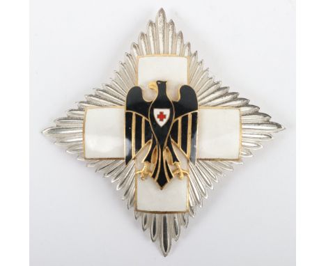 German Red Cross (D.R.K) Honour Badge Breast Star, polished silvered breast star with white enamel Geneva cross to the centre