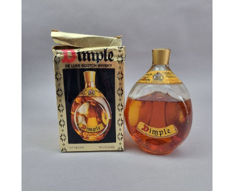 Haig's Dimple Believed 1970's no strength or capacity noted (Please note low fill level and damaged box. Bottle sealed/unopen