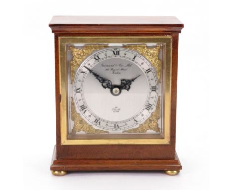 Garrard & Co Ltd; a mahogany and gilt metal cased Elliott clock timepiece, with silvered dial, 12.5cm wide.
