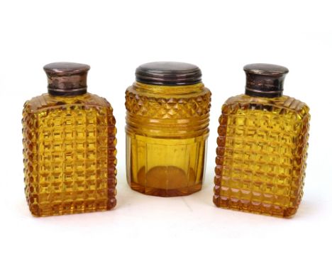 A George III silver mounted cylindrical amber glass toilet jar, John Douglas, London 1818, with pull-off engine turned cover,