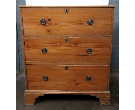 A George III style waxed pine chest, 19th century, fitted with three deep drawers, on bracket feet, 93cm wide x 61cm deep x 1