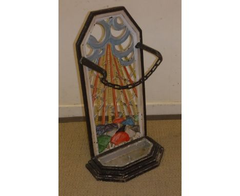 A painted cast iron stick stand, the back panel decorated with a thunder and lightning storm and umbrellas, No'd verso "160-2