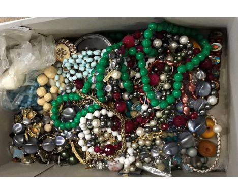 A box of assorted vintage costume jewellery to include mainly beaded necklaces