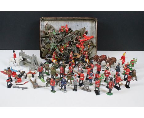 Collection of metal and plastic figures to include Guardsmen, Scottish Guards, Horse Mounted Kings Guards, etc to include exa