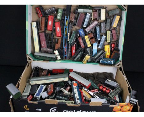100 OO gauge items of rolling stock to include wagons, vans and tankers featuring Hornby, Triang, Lima etc (two boxes)