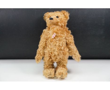 Steiff long nosed teddy bear, complete with tag and button to ear and tag to chest