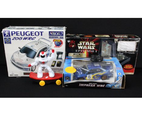 Two boxed Nikko Radio Control cars featuring Peugeot 206 WRC &amp; Impreza WRC, plus 1 x boxed Electronic Star Wars Episode I