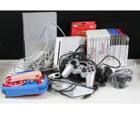 Retro Gaming - Two Retro Gaming consoles featuring a silver Playstation 2 with 1 x 3rd party silver controller, 6 x cased gam