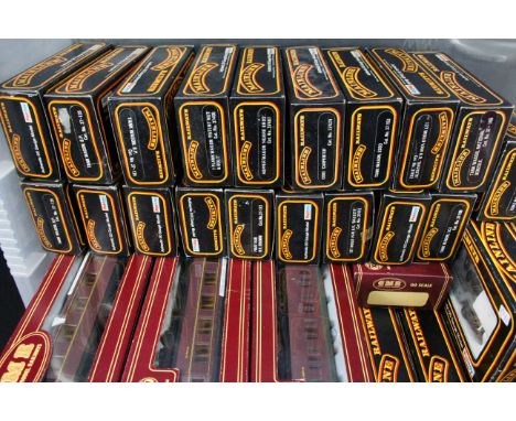 39 Boxed OO gauge items of rolling stock to include 29 x Palitoy Mainline and 10 x Airfix GMR featuring coaches, wagons and v